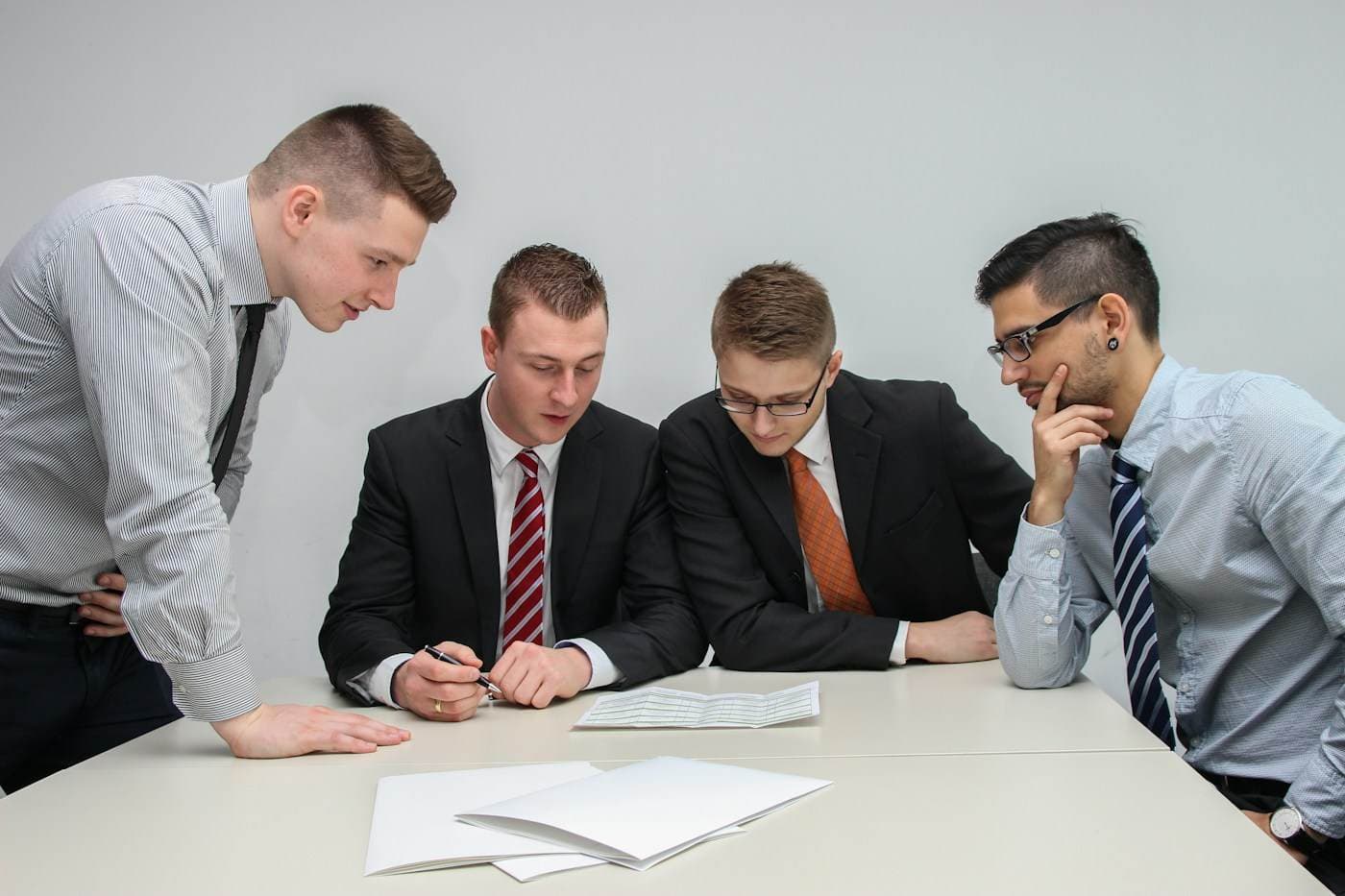 Finance team reviewing reports together